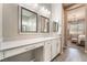 Bright bathroom with double vanity and view into bedroom at 16 Via Stefano, Henderson, NV 89011