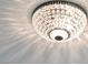 Close-up of an elegant crystal chandelier at 16 Via Stefano, Henderson, NV 89011