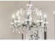 Crystal chandelier adds elegance to a room at 16 Via Stefano, Henderson, NV 89011