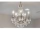 Elegant crystal chandelier with ornate detailing at 16 Via Stefano, Henderson, NV 89011