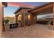 Brick paver courtyard with gated access to garage and covered patio area at 16 Via Stefano, Henderson, NV 89011