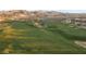 Rolling green golf course with scenic mountain views at 16 Via Stefano, Henderson, NV 89011