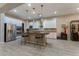 Modern kitchen with stainless steel appliances and an island at 16 Via Stefano, Henderson, NV 89011