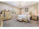 Spacious main bedroom with ornate bed and ample closet space at 16 Via Stefano, Henderson, NV 89011