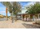 Lakeside cafe with patio seating and beautiful landscaping at 16 Via Stefano, Henderson, NV 89011