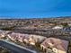 Aerial view of residential neighborhood featuring desert landscaping, and mountain views at 1964 Oliver Springs St, Henderson, NV 89052