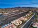 A beautiful aerial view of a community in a scenic desert landscape at sunset at 1964 Oliver Springs St, Henderson, NV 89052