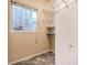 Walk-in closet with built-in storage shelves and a window at 1964 Oliver Springs St, Henderson, NV 89052