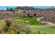 Beautiful golf course featuring manicured greens, sand traps, and the Sun City Anthem community clubhouse at 1964 Oliver Springs St, Henderson, NV 89052