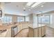 Bright kitchen with granite countertops, stainless steel appliances and an island for casual dining at 1964 Oliver Springs St, Henderson, NV 89052