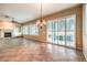 Bright living room with fireplace, built-ins, natural light, and tile flooring at 1964 Oliver Springs St, Henderson, NV 89052