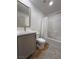 Clean bathroom, featuring a shower/tub combo and updated vanity at 2028 College Pl, Las Vegas, NV 89156