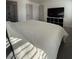 Spacious bedroom with large bed, TV, and ample closet space at 2028 College Pl, Las Vegas, NV 89156