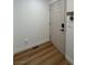 Bright entryway with wood-look flooring and coat closet at 2028 College Pl, Las Vegas, NV 89156