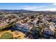 Aerial view of a house and neighborhood near golf course at 2412 Eagleridge Dr, Henderson, NV 89074