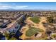 Aerial view showcasing the house's location on a golf course community at 2412 Eagleridge Dr, Henderson, NV 89074