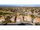 Aerial view of a neighborhood with houses near a golf course at 2412 Eagleridge Dr, Henderson, NV 89074