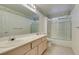 Bathroom with double sinks, shower, and tub at 2412 Eagleridge Dr, Henderson, NV 89074