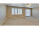 Spacious bedroom with sliding doors and carpet at 2412 Eagleridge Dr, Henderson, NV 89074