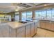 Island kitchen with gas cooktop, tiled floors, and ample cabinet space at 2412 Eagleridge Dr, Henderson, NV 89074