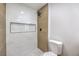 Modern bathroom with marble shower and wood-look tile at 2500 W Oakey Blvd, Las Vegas, NV 89102