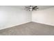 Spacious bedroom with ceiling fan and grey carpet at 2500 W Oakey Blvd, Las Vegas, NV 89102