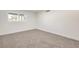 Spacious bedroom with neutral carpeting and natural light at 2500 W Oakey Blvd, Las Vegas, NV 89102