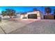 Newly renovated home with a modern exterior and driveway at 2500 W Oakey Blvd, Las Vegas, NV 89102