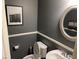 Small powder room with sink and toilet at 3029 Camino Sereno Ave, Henderson, NV 89044