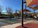 Community playground with swings and shade structures at 3029 Camino Sereno Ave, Henderson, NV 89044