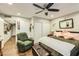 Main bedroom with king-size bed and ceiling fan at 3143 Sonata Dr, Las Vegas, NV 89121