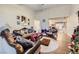 Living room with comfortable furniture and a cozy fireplace at 3143 Sonata Dr, Las Vegas, NV 89121