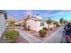 Exterior view of a single-story home with landscaping and walkway at 4950 Larkspur St, Las Vegas, NV 89120