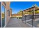 Backyard view showing patio, pool, and house at 5728 Collier Falls Ave, Las Vegas, NV 89139