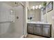 Clean bathroom featuring a walk-in shower and vanity at 5728 Collier Falls Ave, Las Vegas, NV 89139