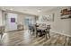 Dining room with hardwood floors and large table at 5728 Collier Falls Ave, Las Vegas, NV 89139