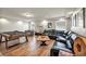 Spacious game room with leather sectional and pool table at 5728 Collier Falls Ave, Las Vegas, NV 89139