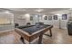 Game room with pool table and wood floors at 5728 Collier Falls Ave, Las Vegas, NV 89139