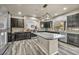 Island kitchen with stainless steel appliances and granite at 5728 Collier Falls Ave, Las Vegas, NV 89139