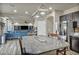 Kitchen with granite island, stainless steel appliances, and view to living room at 5728 Collier Falls Ave, Las Vegas, NV 89139