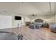 Large main bedroom with hardwood floors and a ceiling fan at 5728 Collier Falls Ave, Las Vegas, NV 89139