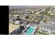 Community overview showcasing homes and pool at 600 N Carriage Hill Dr # 1113, Las Vegas, NV 89138