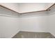 Large walk-in closet with shelving and rod at 600 N Carriage Hill Dr # 1113, Las Vegas, NV 89138