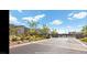 Gated entrance to community with landscaping at 600 N Carriage Hill Dr # 1113, Las Vegas, NV 89138