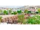 Landscaped community with a wooden footbridge at 600 N Carriage Hill Dr # 1113, Las Vegas, NV 89138