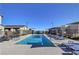 Inviting community pool with lounge chairs at 600 N Carriage Hill Dr # 1113, Las Vegas, NV 89138