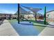 Shaded playground with slides, swings, and colorful surfaces at 600 N Carriage Hill Dr # 1113, Las Vegas, NV 89138