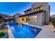 Beautiful backyard featuring a pool, spa, and outdoor seating area at 6800 Equinox Cliff St, Las Vegas, NV 89135