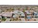 Aerial view of a modern home with a well-manicured yard in a residential neighborhood at 6800 Equinox Cliff St, Las Vegas, NV 89135