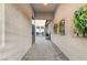 Inviting entrance with stone pavers and decorative plants at 6800 Equinox Cliff St, Las Vegas, NV 89135